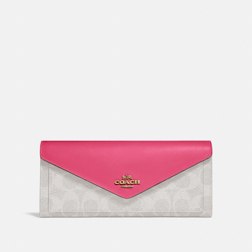 CARTERA SUAVE EN LONA DE LA FIRMA CON BLOQUES DE COLOR