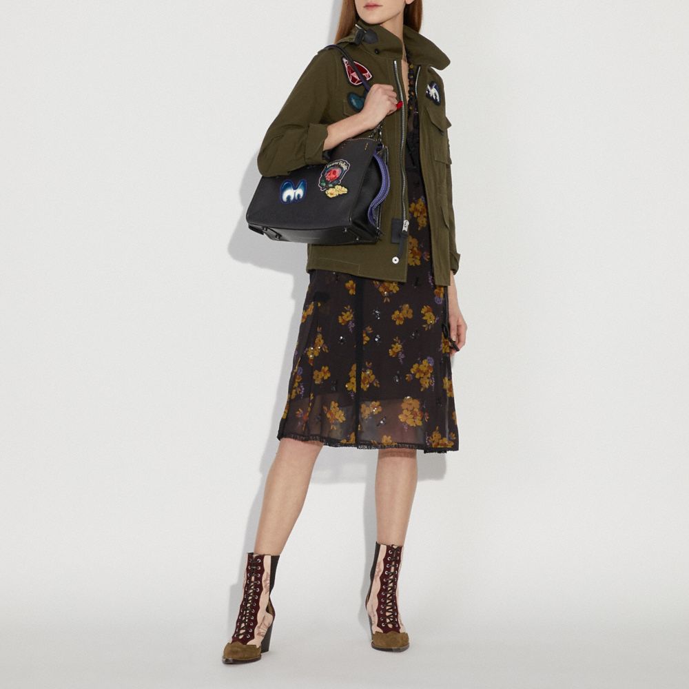 DISNEY X COACH ROGUE WITH PATCHES - Alternate View 1