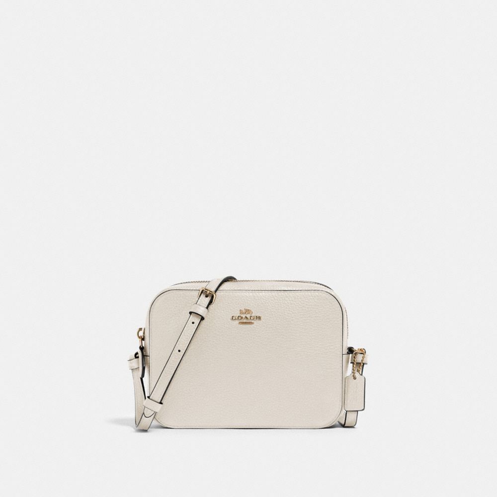 coach white sling bag