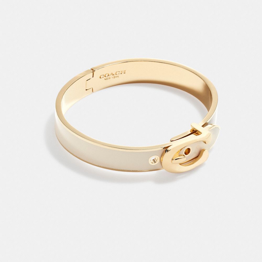 ARMREIF MIT SIGNATURE-SCHNALLE